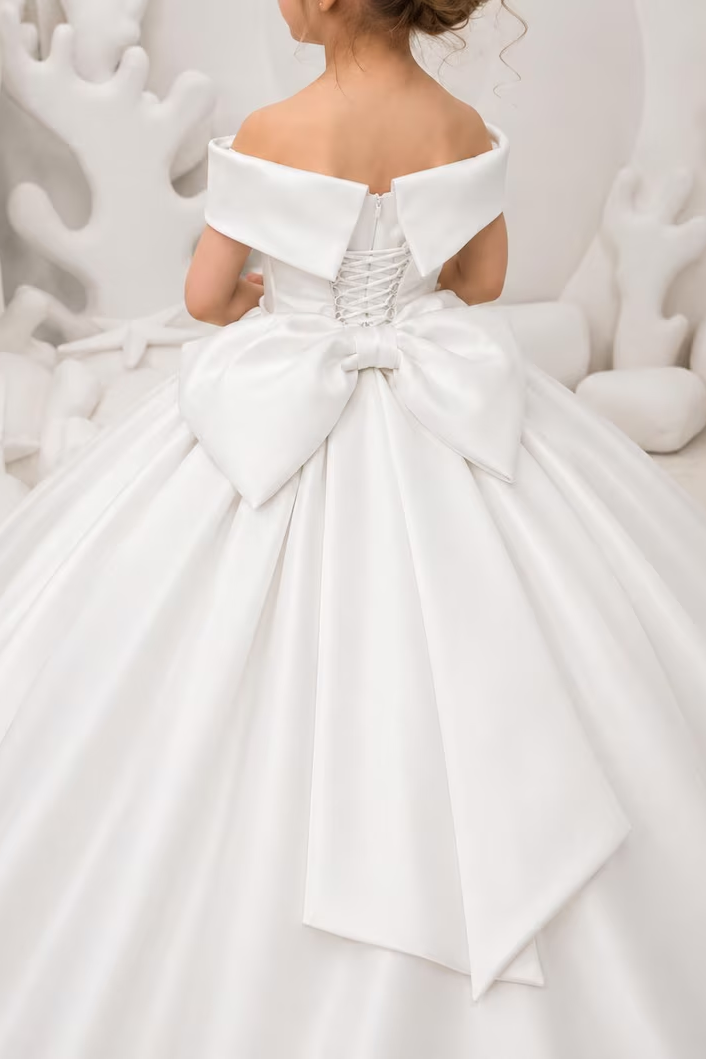 White Off‑the‑Shoulder Satin A‑Line Communion Gown with Large Back Bow