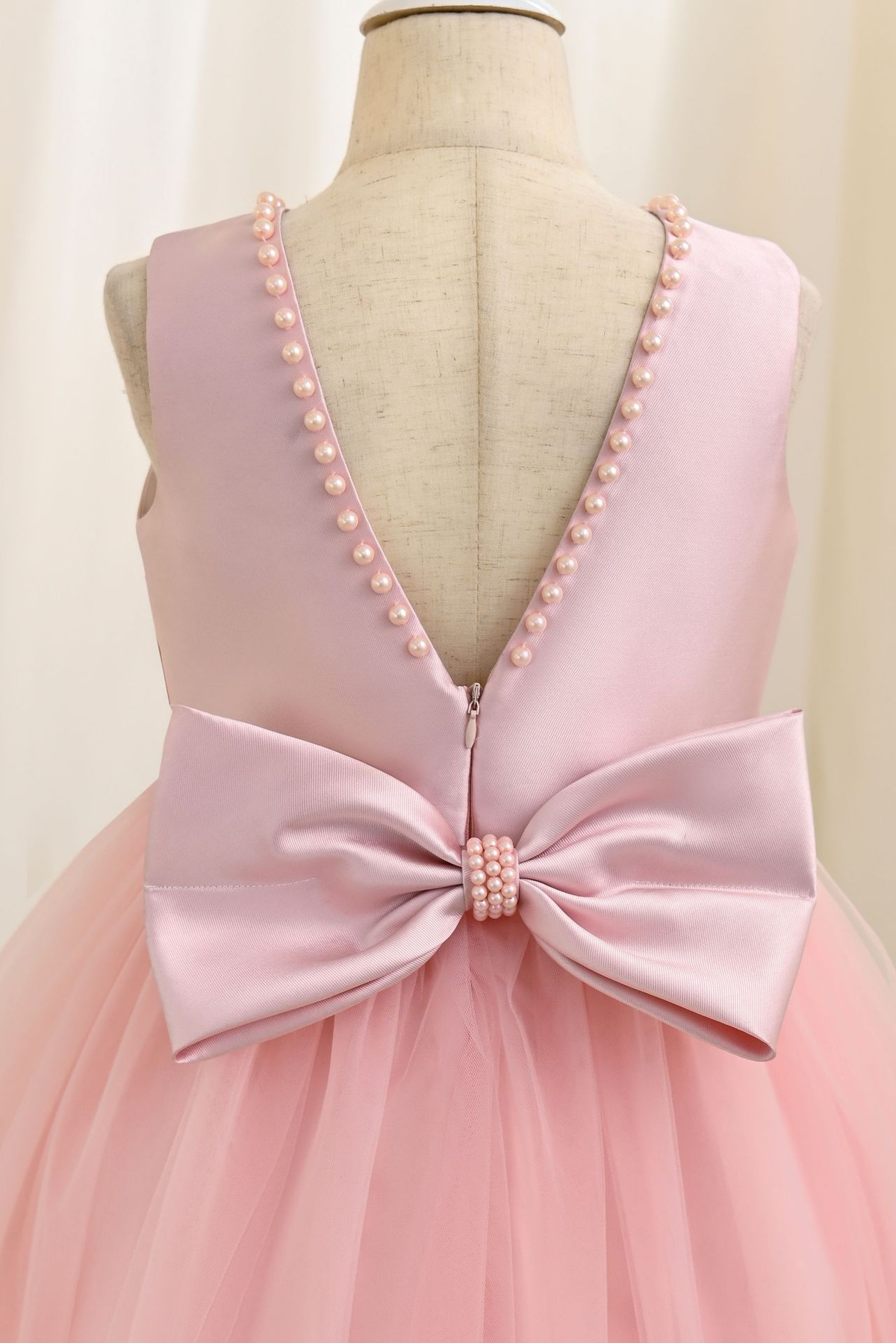 Light Pink Sleeveless Pearl Satin Bow Tulle A-Line Flower Girl Dress